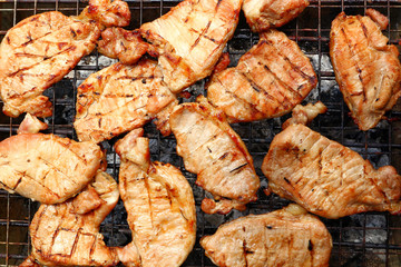 Grilled pork, Barbecue, Grilled BBQ meat food on fireplace grill, Meat meal background cut into grilled pieces top view