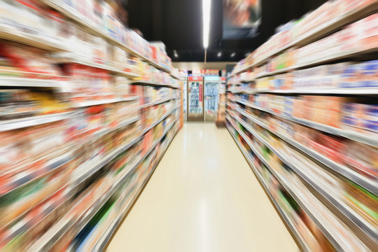 supermarket aisle interior blurred background