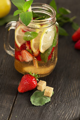 cocktail with fresh fruits, berries and mint