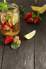 cocktail with fresh fruits, berries and mint