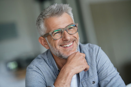 Middle-aged guy with trendy eyeglasses