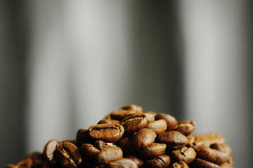 Beautiful background with scattered coffee beans