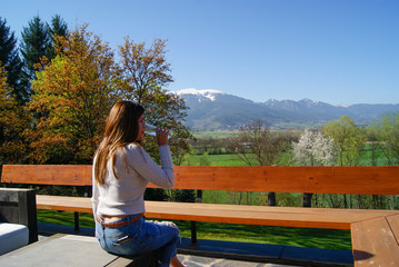 Young girl drinking water in Pyrenees, Spain