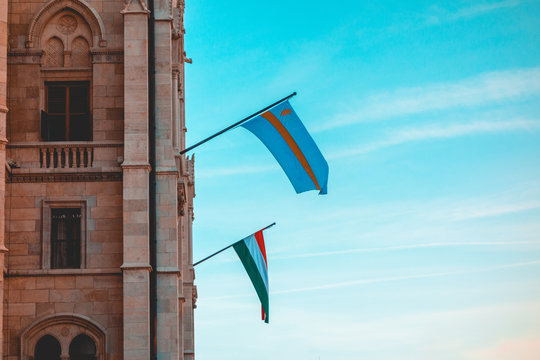 Budapest and Hungary flags on Parliament building with copy space on the right side