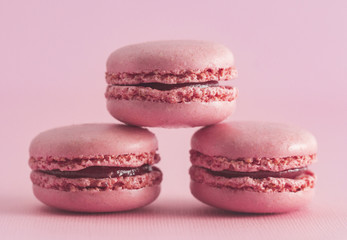 Pink French Macarons on a Pink Background
