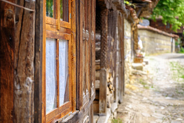 Old wooden window of authentic house in village 1