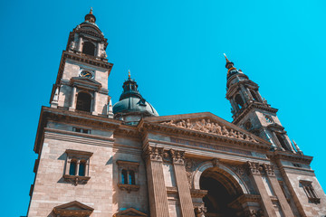 Fototapeta na wymiar low angle view of St. Stephen's Basilica at budapest with the frontside facade and entrance