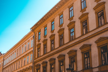 ancient apartment houses with stucco facade - near the St. Stephen's Basilica at Budapest