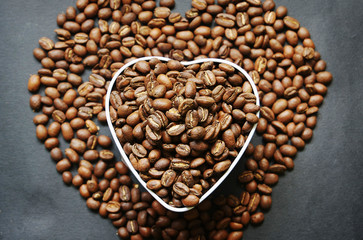 Beautiful background with scattered coffee beans