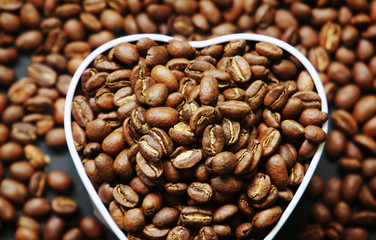 Beautiful background with scattered coffee beans