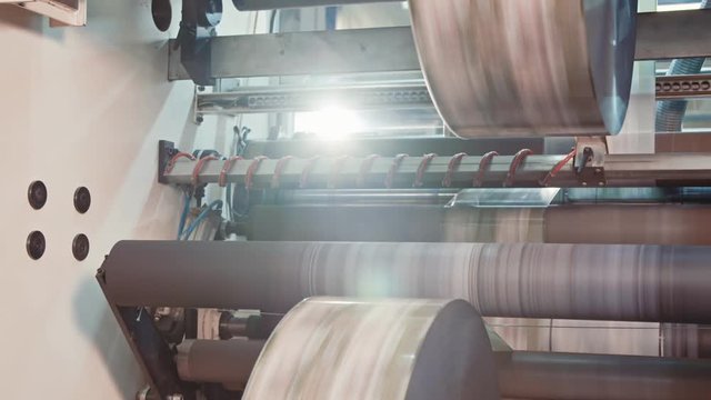 Printing press working at high speed in a large printing facility