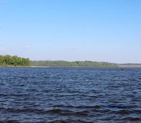 A beautiful sunny day at the lake in the park.