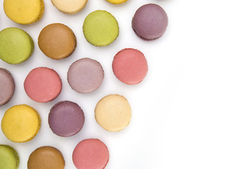 A Variety of French Macarons Flavors on a White Background