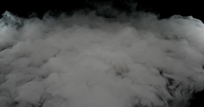 Heavy smoke creeping along black floor mystical compositing element