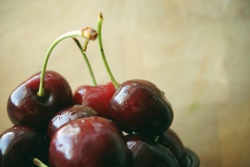 sweet cherry in an iron mug. macro.