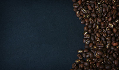 Beautiful background with scattered coffee beans