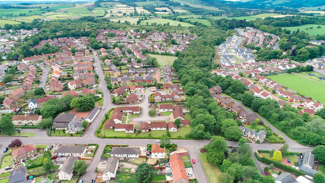 Aerial image over the village of Milton of Campsie, Scotland.