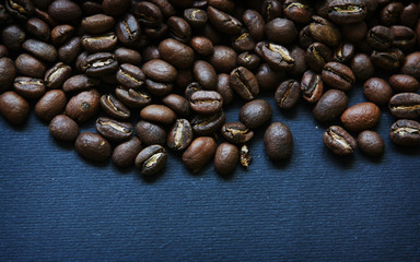 Beautiful background with scattered coffee beans