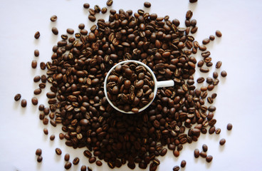Beautiful background with scattered coffee beans
