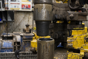 A view for drill pipe connection. View of drilling top drive system on board jack up drilling rig.