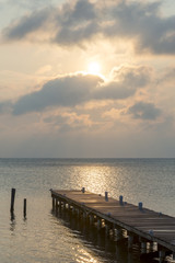 Fototapeta premium Sunrise Over Wooden Jetty