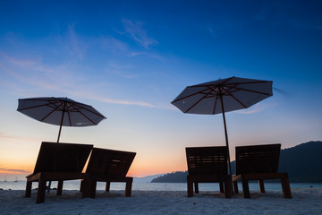 Beautiful colorful of sunset landscape view at beach located at south of thailand