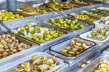 Various kinds of Olives at street Market in Spain.