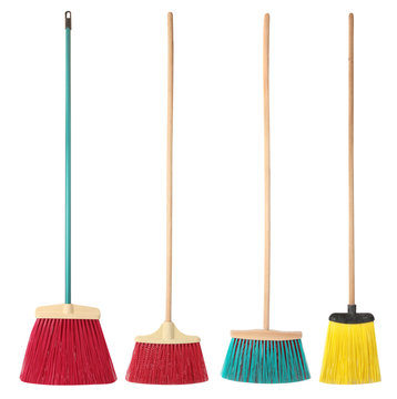 Set of colorful brooms  isolated on a white background. Cleaning the house topic