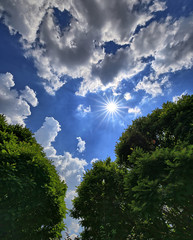 Obraz premium Sonne und Wolken