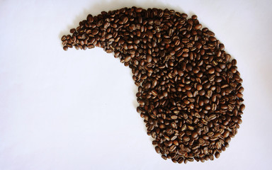 Beautiful background with scattered coffee beans