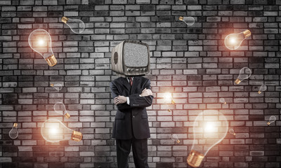 Businessman with old TV instead of head.