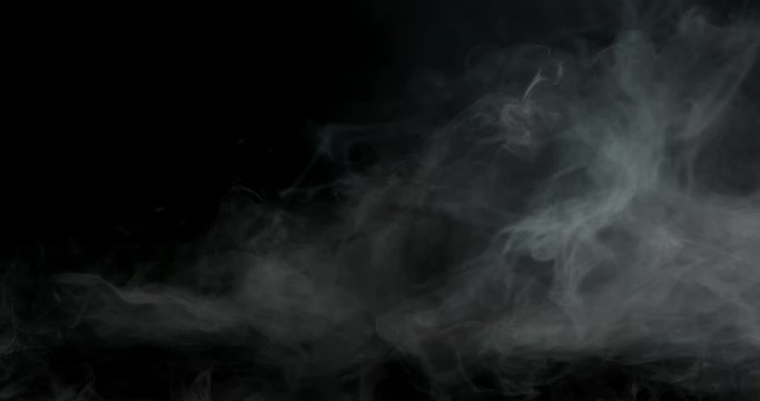 Wispy smoke hanging in frame spooky atmospheric effect