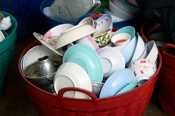 Fototapeta na wymiar many pile dish dirty, pile plate of food is waste trash in basket plastic dirty, pile empty and dirty dish after eating food, plate dirt