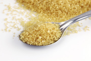 Sugar, Sugar from sugar cane on stainless steel spoon and granulated sugar yellow background, Sugar...