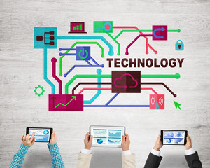 Top view of businesspeople sitting at table and using gadgets