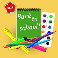green notebook with a signature back to school with school supplies pencils, ruler, markers, paints on a yellow background, with a sticker sale