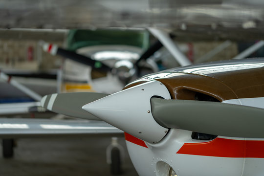Small Sport Aircraft parked in hangar, close up. detail