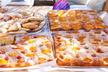 Apricot sponge cakes for sale on Apricot Fair in Porreres, Mallorca, Spain