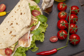 Piadina romagnola with cheese and ham