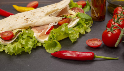 Piadina romagnola with cheese and ham