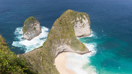 View from the top of the cliff onto the beautiful shore of the island of Nusa Penida not far from the island of Bali