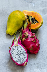 cut exotic fruits dragon fruit and papaya