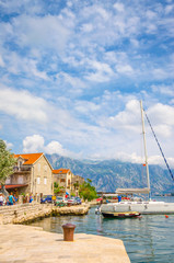 Fototapeta na wymiar beautiful mediterranean landscape. Mountains and fishing boats near town Perast, Kotor bay (Boka Kotorska), Montenegro.