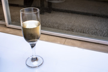 Glass of white wine at table in Brazil