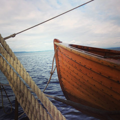 Wooden lifeboat on sailing ship