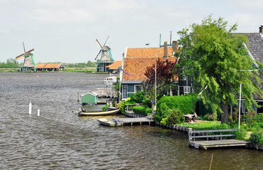 Zaanse Schans in the Netherlands, near Amsterdam.Fishing-village landscapes of windmills.