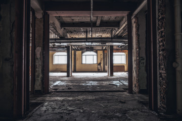 Fototapeta na wymiar Ruins of buildings, abandoned gloomy and terrifying factory buildings