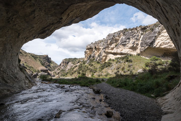 The outlet of Cave Stream, also known as Broken River Cave, situated in Canterbury, New Zealand.
