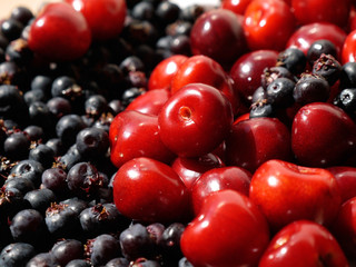 red cherries and black berries