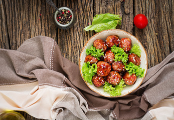 Meatballs with beef in sweet and sour sauce. Asian food. Top view. Flat lay